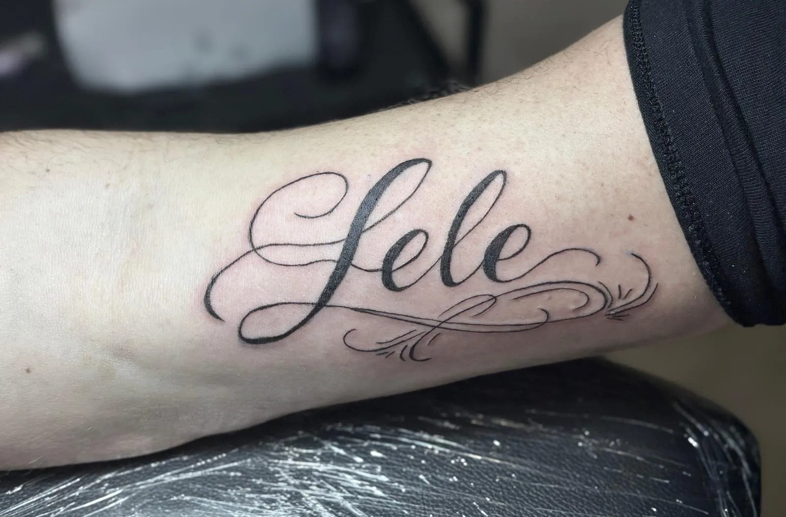 fine line tattoo nome lavoro su cliente